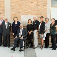 Richard and Helen Devos standing with the Seidman family, and President Emeritus Tom Haas.